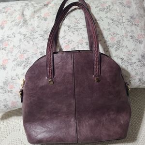 Mauve colored vegan leather handbag by Mellow World